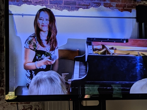 Yoko Miwa on big screen for the overflow audience in the other room for the concert on Martha's Vineyard. Photo by Martin Hanley.